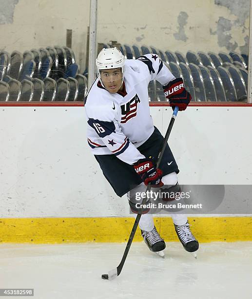 Keegan Iverson of USA White skates against Team Finland during the 2014 USA Hockey Junior Evaluation Camp at the Lake Placid Olympic Center on August...