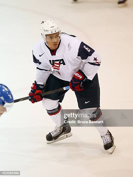 Keegan Iverson of USA White skates against Team Finland during the 2014 USA Hockey Junior Evaluation Camp at the Lake Placid Olympic Center on August...