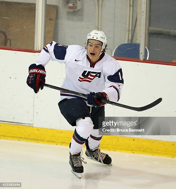 Sonny Milano of USA White skates against Team Finland during the 2014 USA Hockey Junior Evaluation Camp at the Lake Placid Olympic Center on August...