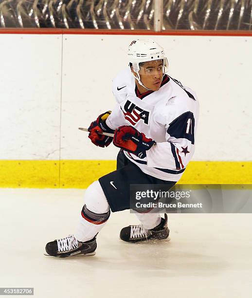 Keegan Iverson of USA White skates against Team Finland during the 2014 USA Hockey Junior Evaluation Camp at the Lake Placid Olympic Center on August...