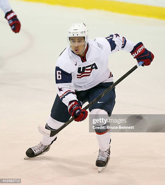 Keegan Iverson of USA White skates against Team Finland during the 2014 USA Hockey Junior Evaluation Camp at the Lake Placid Olympic Center on August...