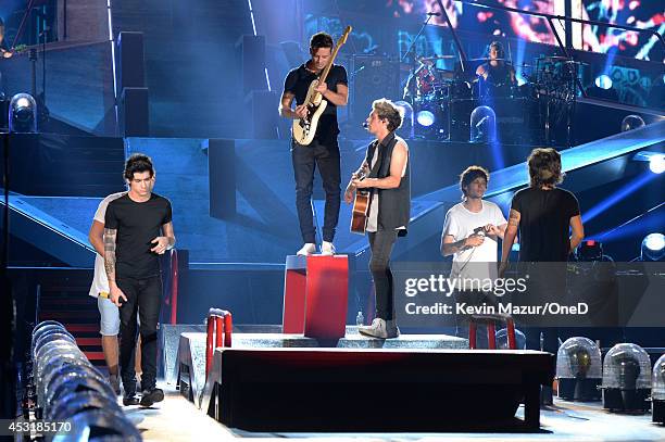 One Direction performs onstage during the "Where We Are" tour at Met Life Stadium on August 4, 2014 in New York City.