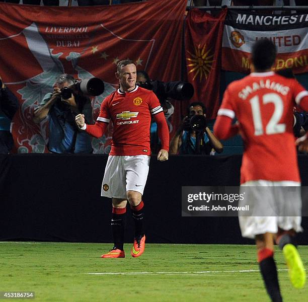 Wayne Rooney of Manchester United celebrates after scoring during the International Champions Cup 2014 final match between Liverpool FC and...