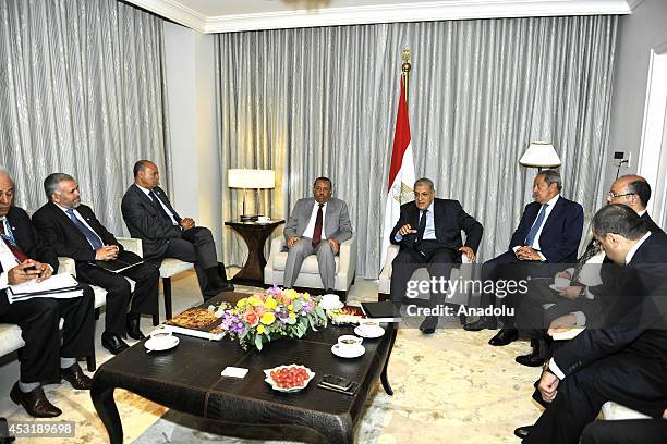 Egyptian Prime Minister Ibrahim Mihlib meets with Libya's interim Prime Minister Abdullah al-Thani during his visit to Washington, United States on...