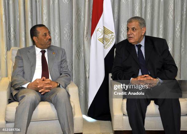 Egyptian Prime Minister Ibrahim Mihlib meets with Libya's interim Prime Minister Abdullah al-Thani during his visit to Washington, United States on...