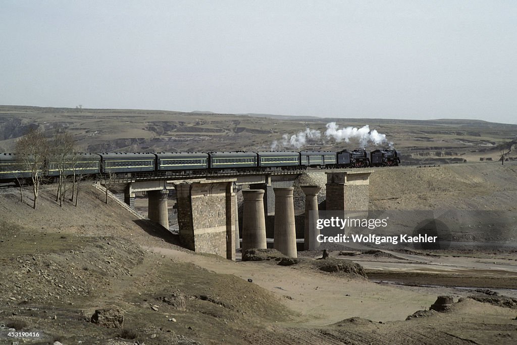 China, China Orient Express Going Over Bridge...