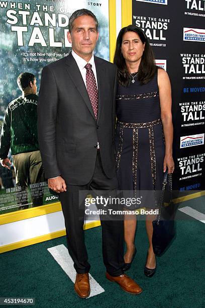 Actor Jim Caviezel and Kerri Browitt Caviezel attend the "When The Game Stands Tall" Los Angeles premiere held at the ArcLight Hollywood on August 4,...