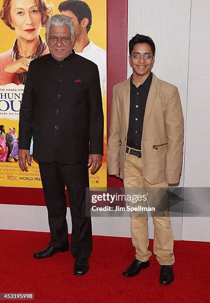 Actor Om Puri and guest attend the "The Hundred-Foot Journey" New York Premiere at Ziegfeld Theater on August 4, 2014 in New York City.