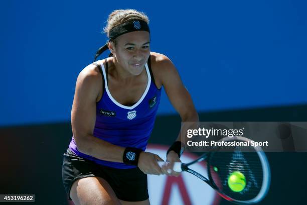 Heather Watson of Great Britain plays a backhand in her second round match against Ksenia Pervak of Kazakhstan during day three of the 2013...