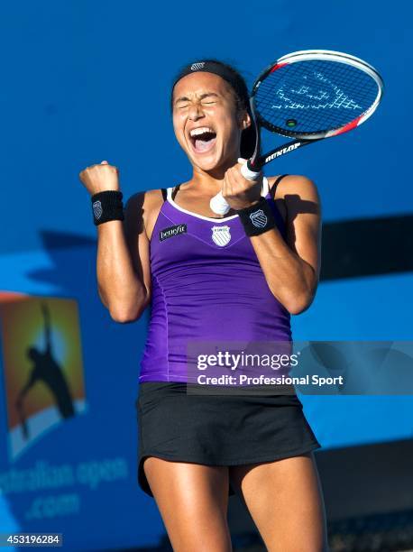 Heather Watson of Great Britain celebrates winning her second round match against Ksenia Pervak of Kazakhstan during day three of the 2013 Australian...