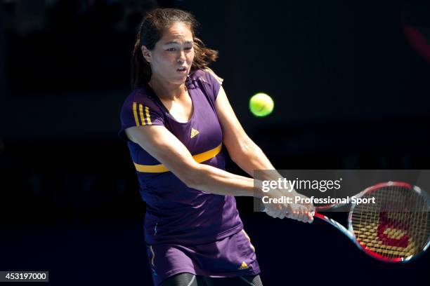 Jamie Hampton of the United States plays a backhand in her third round match against Victoria Azarenka of Belarus during day six of the 2013...
