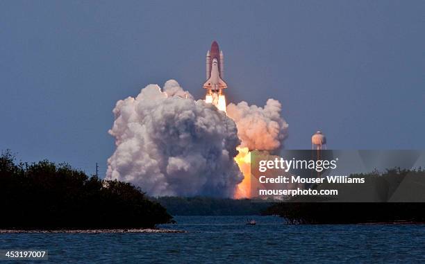 sts-125 clears the tower - nasa stock pictures, royalty-free photos & images