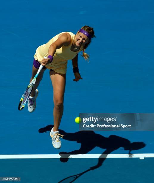 Victoria Azarenka of Belarus serves in her third round match against Jamie Hampton of the United States during day six of the 2013 Australian Open at...