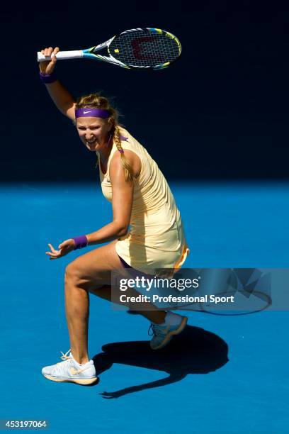 Victoria Azarenka of Belarus plays a forehand in her third round match against Jamie Hampton of the United States during day six of the 2013...