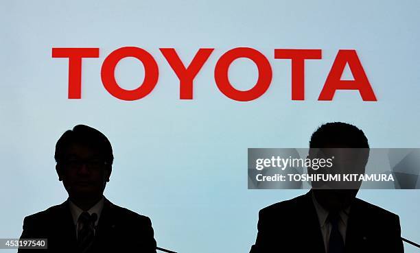 Toyota Motors managing officers, Koki Konishi and Takuo Sasaki attend a press conference announcing the company's financial results at its...