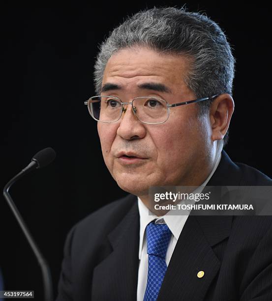 Toyota Motors managing officer Takuo Sasaki speaks during the press conference announcing the company's financial results at its headquarters in...