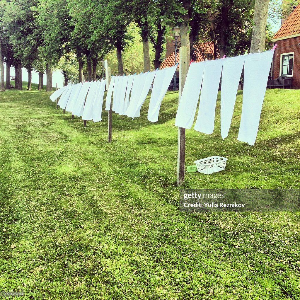 White towels drying on washing line