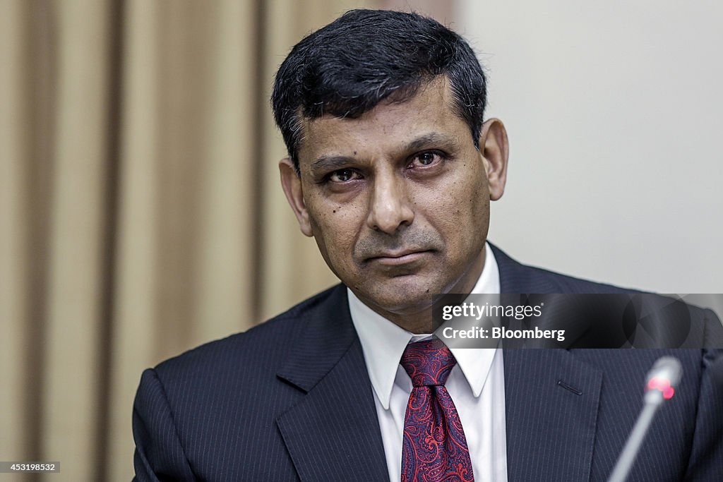 Reserve Bank of India Governor Rajan Unveils Interest-Rate Decision And Images Of Market Reactions