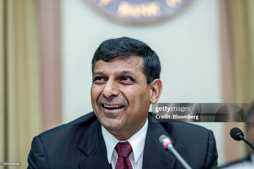 Reserve Bank of India Governor Rajan Unveils Interest-Rate Decision And Images Of Market Reactions