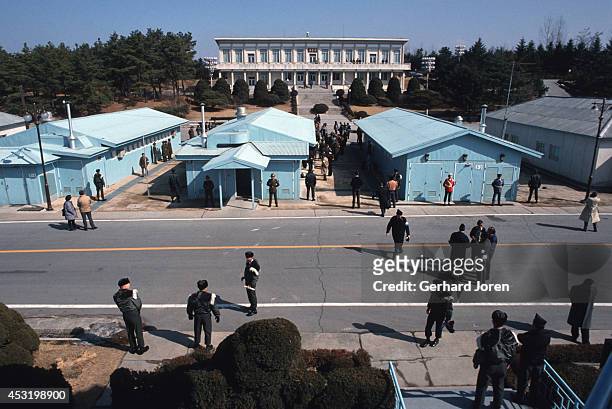 American soldiers in Panmunjom on the 38th parallel in the DMZ, or demilitarised zone. This 2.5 mile wide, 156 mile long no man's land separates...