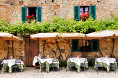 Outdoor trattoria in a quiant village in Tuscany, Italy