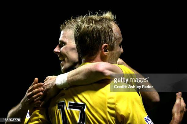 Andrew Keogh of the Glory celebrates a goal with teammate Mitch Nichols during the FFA Cup match between the Newcastle Jets and the Perth Glory at...