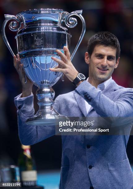 Novak Djokovic of Serbia poses with the 2012 ATP World Tour No.1 Award on day two of the ATP World Tour Finals at the O2 Arena on November 6, 2012 in...