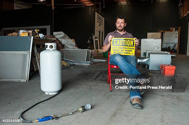 Jake Ryan on site of his Open Bench Project on Thomspon's Point on Wednesday, July 23, 2014. Ryan has leased a 6,000-square-foot space as a community...