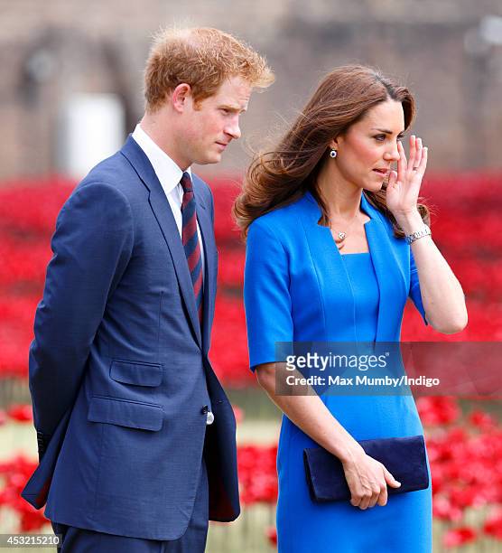 Prince Harry and Catherine, Duchess of Cambridge visit the poppy field art installation entitled 'Blood Swept Lands and Seas of Red' by artist Paul...