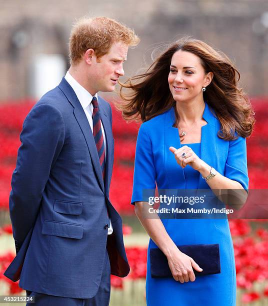 Prince Harry and Catherine, Duchess of Cambridge visit the poppy field art installation entitled 'Blood Swept Lands and Seas of Red' by artist Paul...