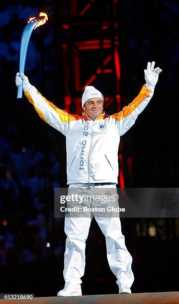 The Opening Ceremonies for the 2006 Olympic Winter Games were held in Stadio Olimpico in downtown Turin, Italy. Here, Italian skiing legend Alberto...