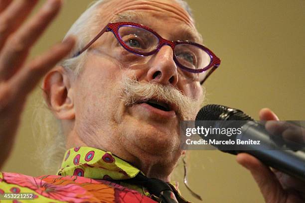 Dr. Patch Adams, founder of the Gesundheit Institute, speaks to students during a conference about laughter therapy at Santo Tomás University on...