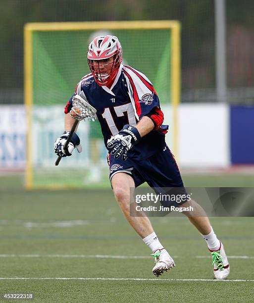 Brodie Merrill of the Boston Cannons looks for an open man during a game with the Florida Launch at Harvard Stadium on August 2, 2014 in Boston,...