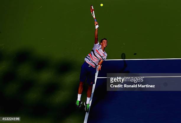 Vasek Pospisil of Canada serves to Richard Gasquet of France during Rogers Cup at Rexall Centre at York University on August 5, 2014 in Toronto,...