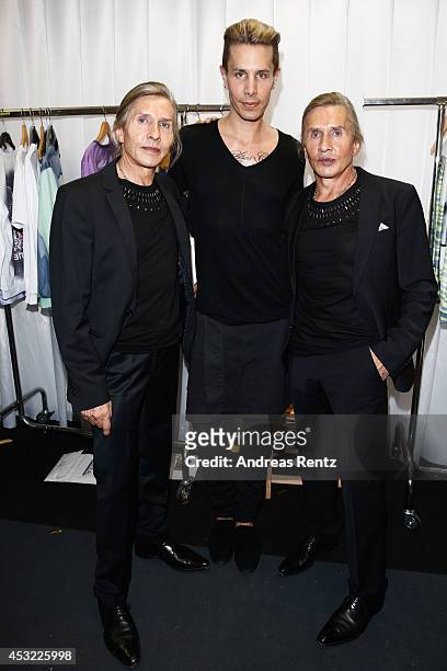 Designer Florian Wess with Arnold and Oskar Wess attend GarconF fashion show at Balloni-Hallen on August 5, 2014 in Cologne, Germany.