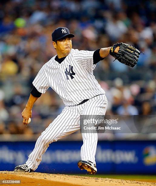 Hiroki Kuroda of the New York Yankees pitches in the third inning against the Detroit Tigers at Yankee Stadium on August 5, 2014 in the Bronx borough...