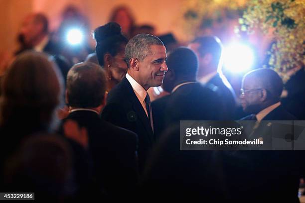 President Barack Obama arrives at a dinner on the occassion of the U.S.-Africa Leaders Summit on the South Lawn of the White House August 5, 2014 in...