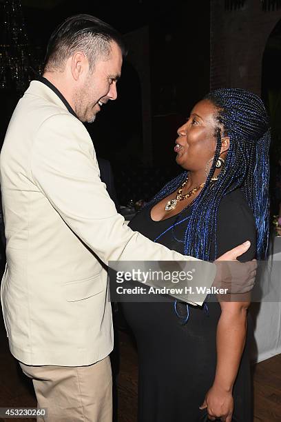 Designer Roland Mouret and Raquel Smith attends the Roland Mouret for Banana Republic Collection Launch on August 5, 2014 at White Street Restaurant...