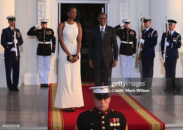 Rwanda President Paul Kagame and daughter Ange Ingabire Kagame arrive at the North Portico of the White House for a State Dinner on the occasion of...