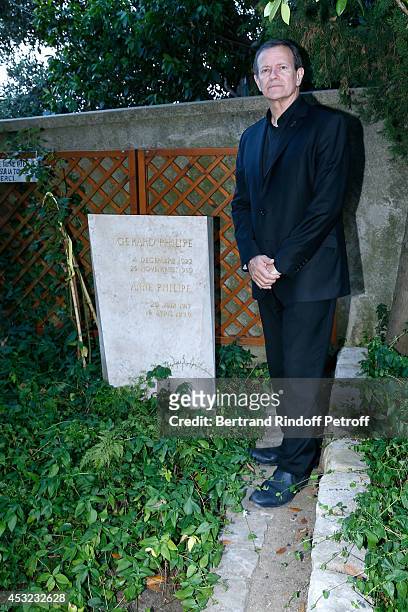 Francis Huster pays tribute to Gerard Philipe in the cemetery of Ramatuelle for the 30th Ramatuelle Festival on August 5, 2014 in Ramatuelle, France.