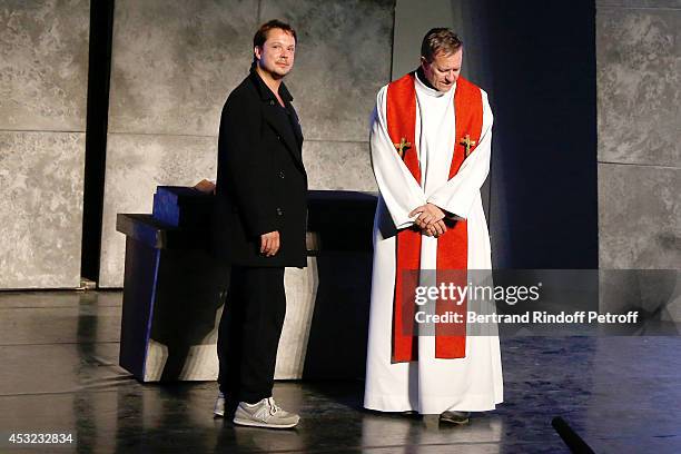 Actors Davy Sardou and Francis Huster perform in "L'Affrontement" play during the 30th Ramatuelle Festival : Day 5 on August 5, 2014 in Ramatuelle,...