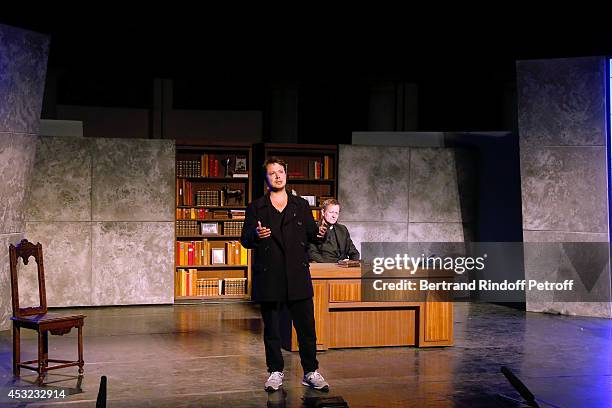 Actors Davy Sardou and Francis Huster perform in "L'Affrontement" play during the 30th Ramatuelle Festival : Day 5 on August 5, 2014 in Ramatuelle,...