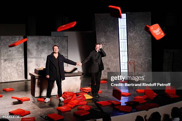 Actors Davy Sardou and Francis Huster during the traditional throw of cushions at the final of "L'Affrontement" play during the 30th Ramatuelle...