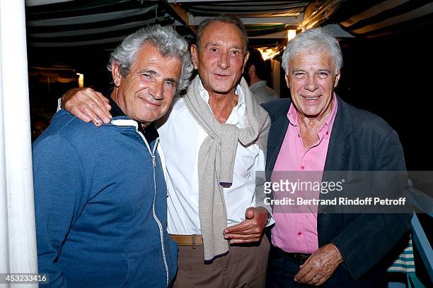 Artistic Director of the Festival Michel Boujenah, Bertrand Delanoe and Guy Bedos pose after "L'Affrontement" play during the 30th Ramatuelle...