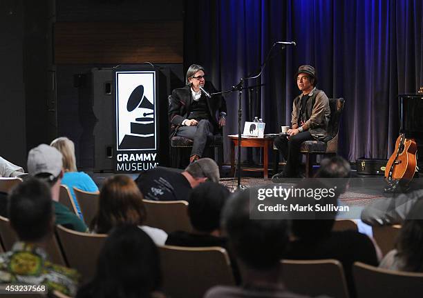 Vice President of the GRAMMY Foundation Scott Goldman and musician Nils Lofgren onstage during An Evening With Nils Lofgren at The GRAMMY Museum on...