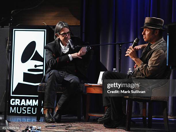 Vice President of the GRAMMY Foundation Scott Goldman and musician Nils Lofgren onstage during An Evening With Nils Lofgren at The GRAMMY Museum on...