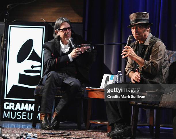 Vice President of the GRAMMY Foundation Scott Goldman and musician Nils Lofgren onstage during An Evening With Nils Lofgren at The GRAMMY Museum on...