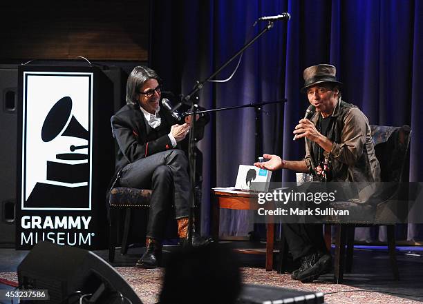 Vice President of the GRAMMY Foundation Scott Goldman and musician Nils Lofgren onstage during An Evening With Nils Lofgren at The GRAMMY Museum on...