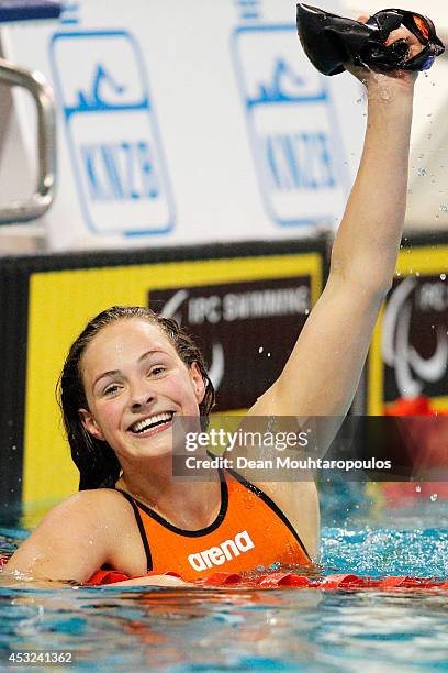 Chantalle Zijderveld of the Netherlands celebrates after she competes and wins the Women's 100m Breaststroke SB9 final during the IPC Swimming...