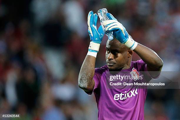 Goalkeeper, Vincent Enyeama of Lille applaudes the home fans at half time during the UEFA Champions League third qualifying round 2nd leg match...